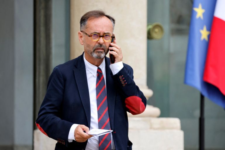 French Mayor of Beziers, Robert Menard speaks on the phone as he leaves the presidential Elysee Palace, after a meeting between France's President and mayors of cities affected by the violent clashes that erupted after a teen was shot dead by police last week, in Paris, France, July 4, 2023. LUDOVIC MARIN/Pool via REUTERS
