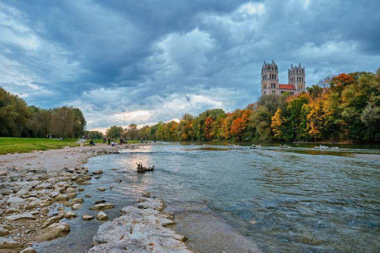 Munich view - Isar river, park and St Maximilian church from Reichenbach Bridge. Munchen, Bavaria, Germany.