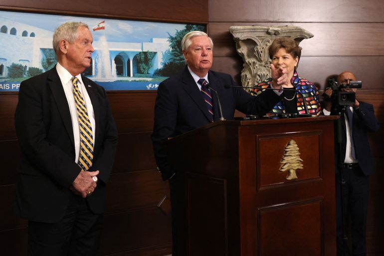 US Senator Lindsey Graham (C), accompanied by Senator Jeanne Shaheen (R), delivers a statement following a meeting with Lebanon's president at the Presidential Palace in Baabda on August 26, 2025.