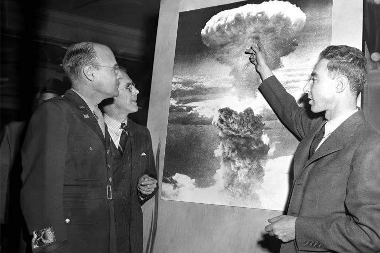 Scientists Visit Atomic Exhibit Three of the men who played leading roles in the development of the atomic bomb visit the American Chemical Society Atomic Exhibit in Grand Central Palace. Looking at a photo of the atomic explosion over Nagasaki, Japan, are left to right, Brig. Gen. K. D. Nichols, Prof. H.D. Smythe who wrote the government atomic report and J.R. Oppenheimer, director of the Los Alamos, N.M. atomic labratory. GettyImages-515335876