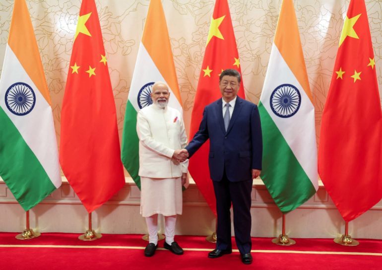 India's Prime Minister Narendra Modi shakes hands with Chinese President Xi Jinping during a meeting on the sidelines of Shanghai Cooperation Organisation (SCO) Summit in Tianjin, China, August 31, 2025. India's Press Information Bureau/Handout via REUTERS THIS IMAGE HAS BEEN SUPPLIED BY A THIRD PARTY. NO RESALES. NO ARCHIVES.
