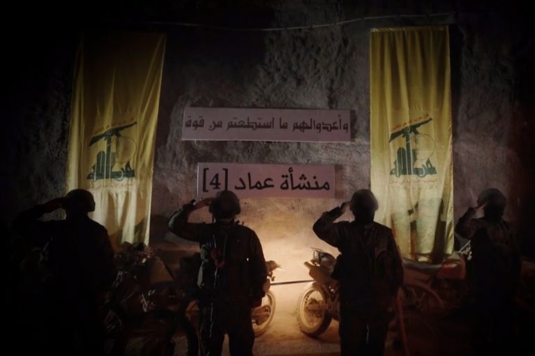 مقاتلون من حزب الله ضمن مقطع نُشر للإعلان عن منشأة 