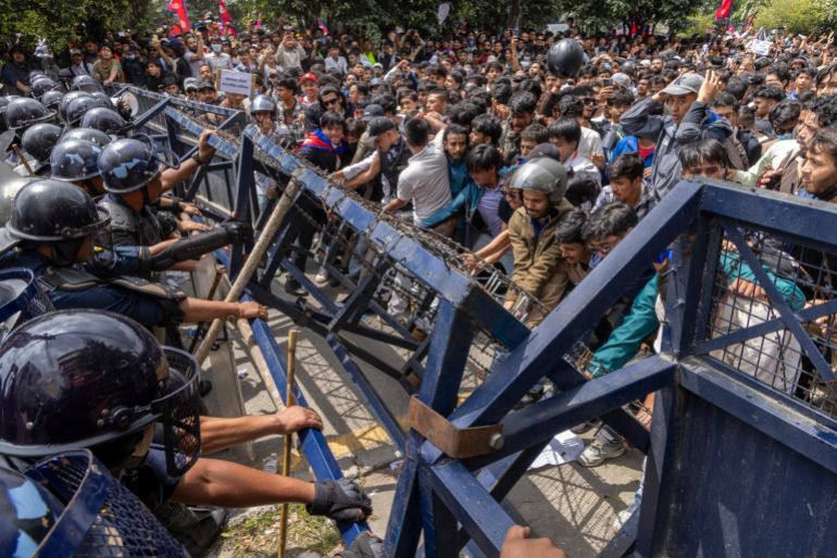 epa12362238 Protesters clash with police in front of the parliament building in Kathmandu, Nepal, 08 September 2025. Young demonstrators gathered in the capital to demand an end to corruption and the lifting of social media bans. The government shut down 26 platforms, including Facebook, YouTube, Instagram, and WhatsApp, after they refused to register in Nepal. At least six people were killed and dozens were injured during the protest. EPA/NARENDRA SHRESTHA