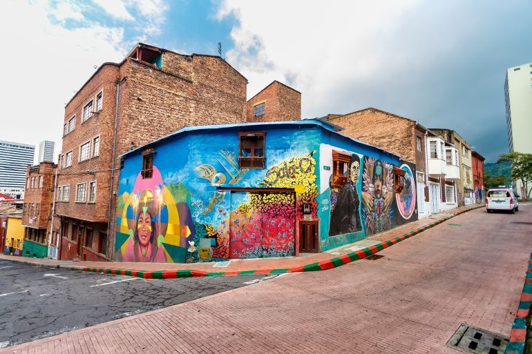 Bogota, Colombia - January 1, 2023: Mural on the wall of a house in the district of La Candelaria