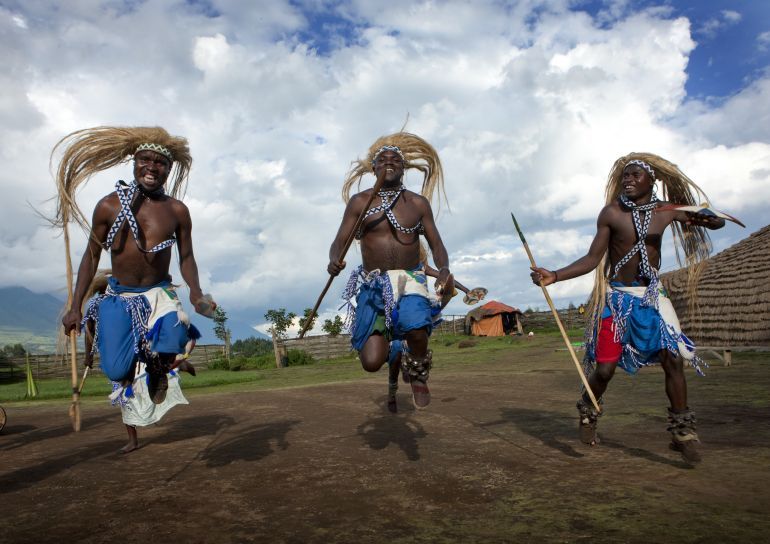 RWANDA - MARCH 22: Intore dancer in Ibwiwachu village in Rwanda on March 22, 2010 - The Intore dancers have been active poachers for centuries, they have an amazing traditional dance, using headresses that go up in the sky. The dances are about the gorillas who live very close to the villages. There are tutsi and hutu in the dancers. (Photo by Eric LAFFORGUE/Gamma-Rapho via Getty Images)