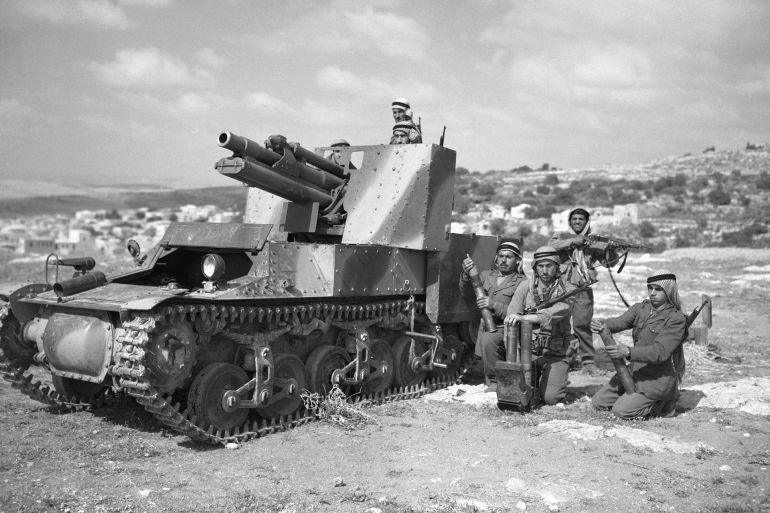 (Original Caption) 6/8/1948-Jerusalem, Israel: Soldiers of the Arab Liberation Army man a modern type mobile gun as they shell Jewish positions in the Bab El Wad area. Fighting in the area continues as Jewish forces strive to recapture the vital supply route from Tel Aviv to Jerusalem.