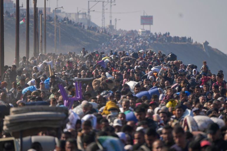 Displaced Palestinians return to their homes in the northern Gaza Strip, following Israel's decision to allow thousands of them to go back for the first time since the early weeks of the 15-month war with Hamas, Monday, Jan. 27, 2025. (AP Photo/Abdel Kareem Hana)