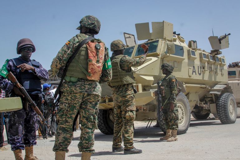 FILE - African Union peacekeepers from Uganda provide security as Somali lawmakers arrive to cast their vote in the presidential election, at the Halane military camp in Mogadishu, Somalia Sunday, May 15, 2022. (AP Photo/Farah Abdi Warsameh, File)
