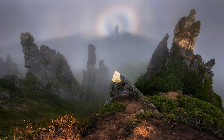 A Brocken spectre with glory around a hiker in the Ukrainian Carpathians in 2021Михайло Пецкович - Own work A Brocken spectre with glory on Mount Shpyci in the Carpathians, Ukraine. Yaremchansk city council, Verkhovynskyi district, Nadvirnyanskyi district