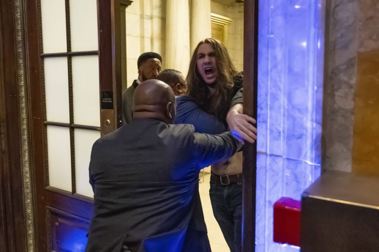 NEW YORK, UNITED STATES - MAY 29: New York Public Library security remove a protestor from inside the venue as multiple demonstrators disrupted United States Senator Chuck Schumer’s book signing event inside New York Public Library in New York, U.S., May 29, 2025