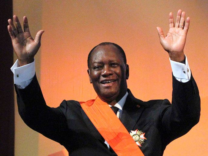 Ivory Coast President Alassane Ouattara waves during his inauguration ceremony at the Felix Houphouet-Boigny Foundation in Yamoussoukro May 21, 2011. Ouattara was inaugurated as president of Ivory Coast on Saturday