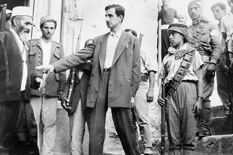 Late Lebanese Druze leader Kamal Jumblatt of the Progressive Socialist Party, confers with his fighters in the montainous Chouf region during the lebanese internal strifein Lebanon after failing to win in a Parliamentary elections and seized control of Chouf region. He then tried to violently unite Lebanon with Syria and Egypt to make one country. The revolt was quickly put down. By 1975, he had become the leader of the National Movement whose members fought alongside Palestinian fighters against lebanese christian forces. He was assasinated by alleged Syrian agents 16 march 1977. He was the father of the current lebanese pro-independence opposition leader Walid Jumblatt. AFP PHOTO