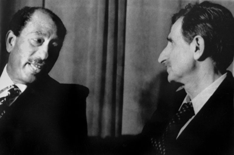 Egyptian President Anwar Sadat (L) meets with Lebanese leftist political leader Kamal Jumblatt (R), 29 September 1976, during a ceremony to mark the 6th anniversary of the death of former Egyptian President Gamal Abdel Nasser. (Photo by AFP)