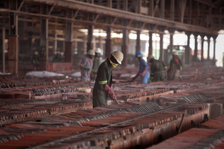 A worker handles copper sheets during electrolytic refining in the metallurgical plant at Katanga Mining Ltd.'s copper and cobalt mine in Kolwezi, Katanga province, Democratic Republic of Congo, on Wednesday, Aug. 1, 2012. Israeli billionaire Dan Gertler, whose grandfather co-founded Israel's diamond exchange in 1947, arrived in Congo in 1997 seeking rough diamonds. Since those early days, Gertler has invested in iron ore, gold, cobalt and copper as well as agriculture, oil and banking. Photographer: Simon Dawson/Bloomberg via Getty Images