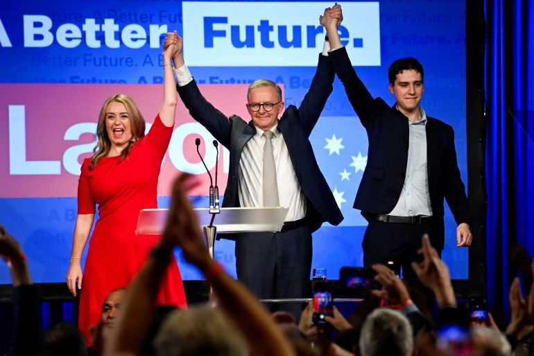 Anthony Albanese, leader of Australia's Labor Party is accompanied by his partner Jodie Haydon and son Nathan Albanese while he addresses his supporters after incumbent Prime Minister and Liberal Party leader Scott Morrison conceded defeat in the country's general election, in Sydney, Australia May 21, 2022. REUTERS/Jaimi Joy