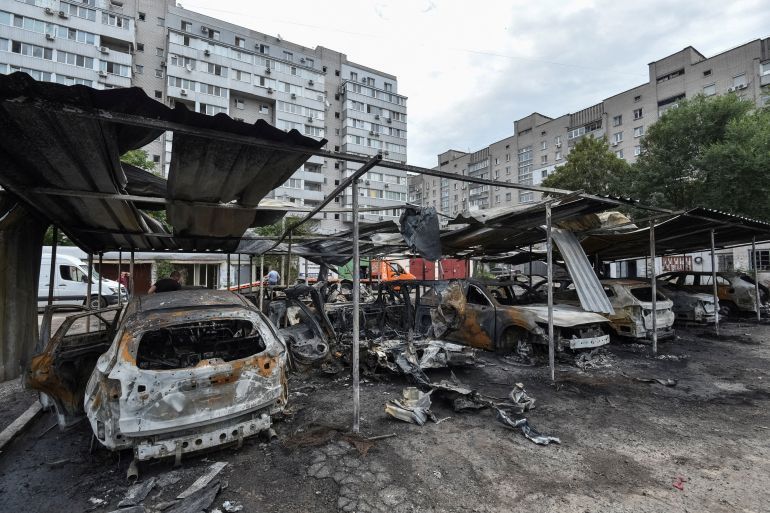 A view shows burned cars at the site of the Russian drone strike, amid Russia's attack on Ukraine, in Dnipro, Ukraine July 26, 2025. REUTERS/Mykola Synelnykov TPX IMAGES OF THE DAY