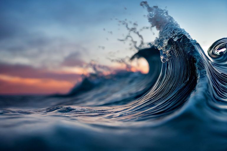 foamy waves rolling up in ocean المصدر: أدوبي ستوك