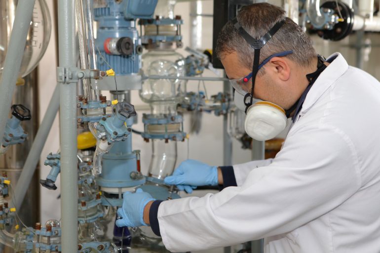 Technician dealing with water purification system