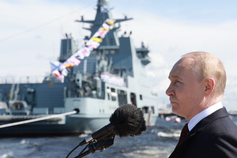 (FILES) In this pool photograph distributed by the Russian state agency Sputnik, Russia's President Vladimir Putin attends the main naval parade marking the Russian Navy Day in Saint Petersburg on July 28, 2024.