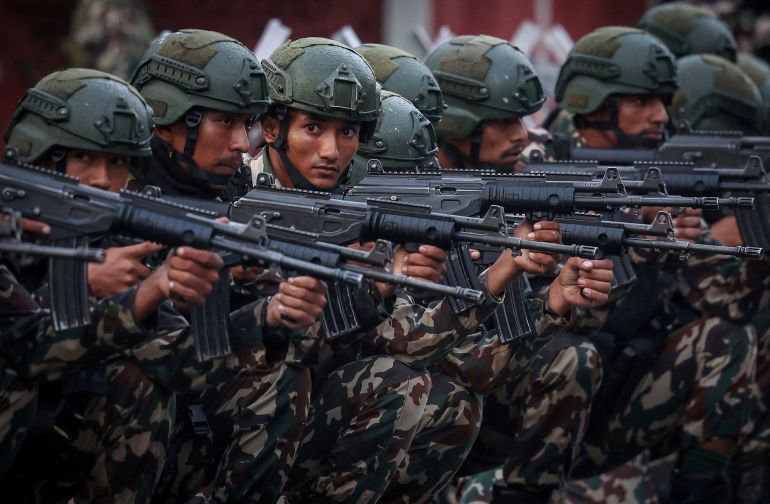 Nepali Army soldiers guard outside presidential building