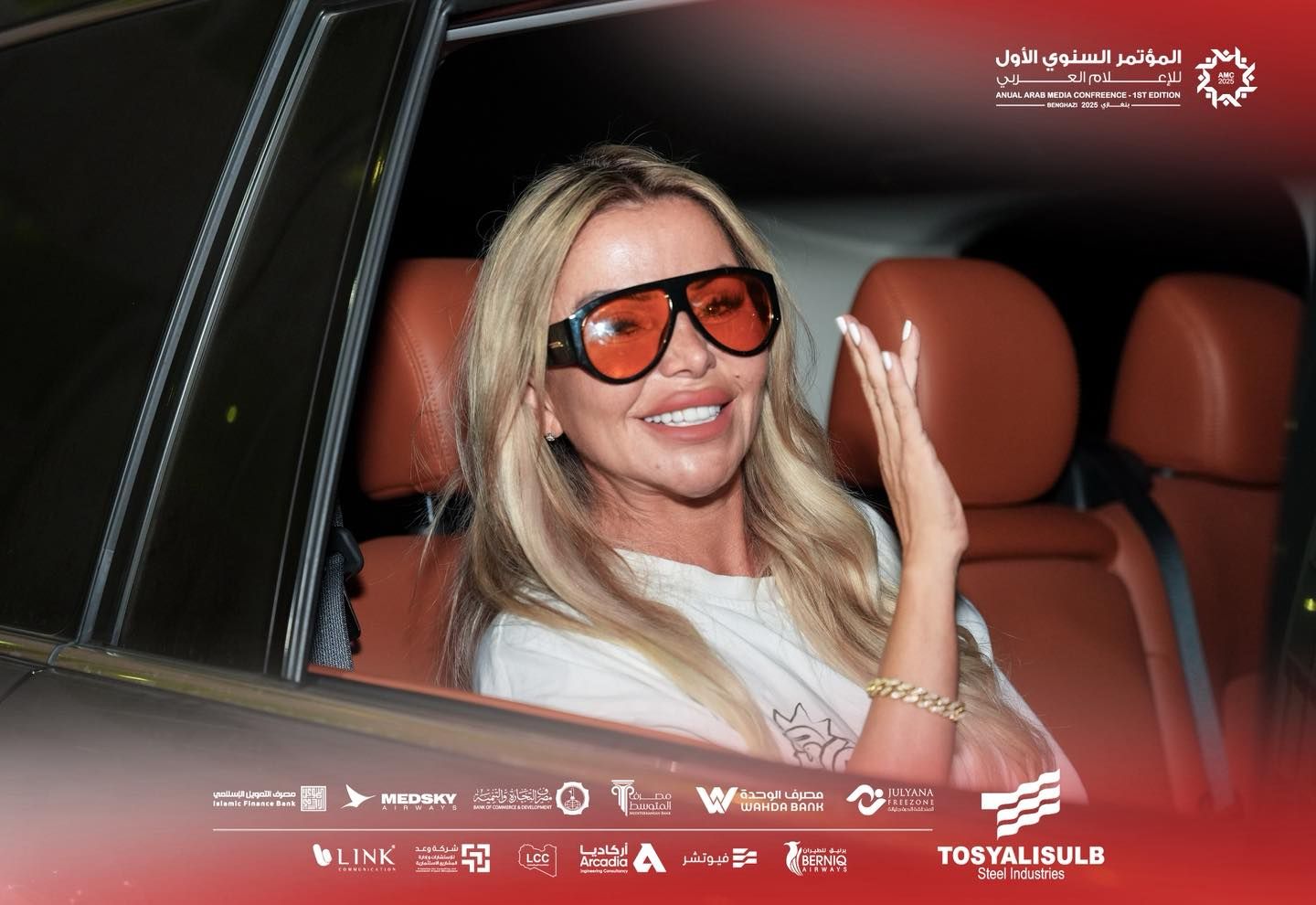 May be an image of 1 person, blonde hair, car, eyewear and text