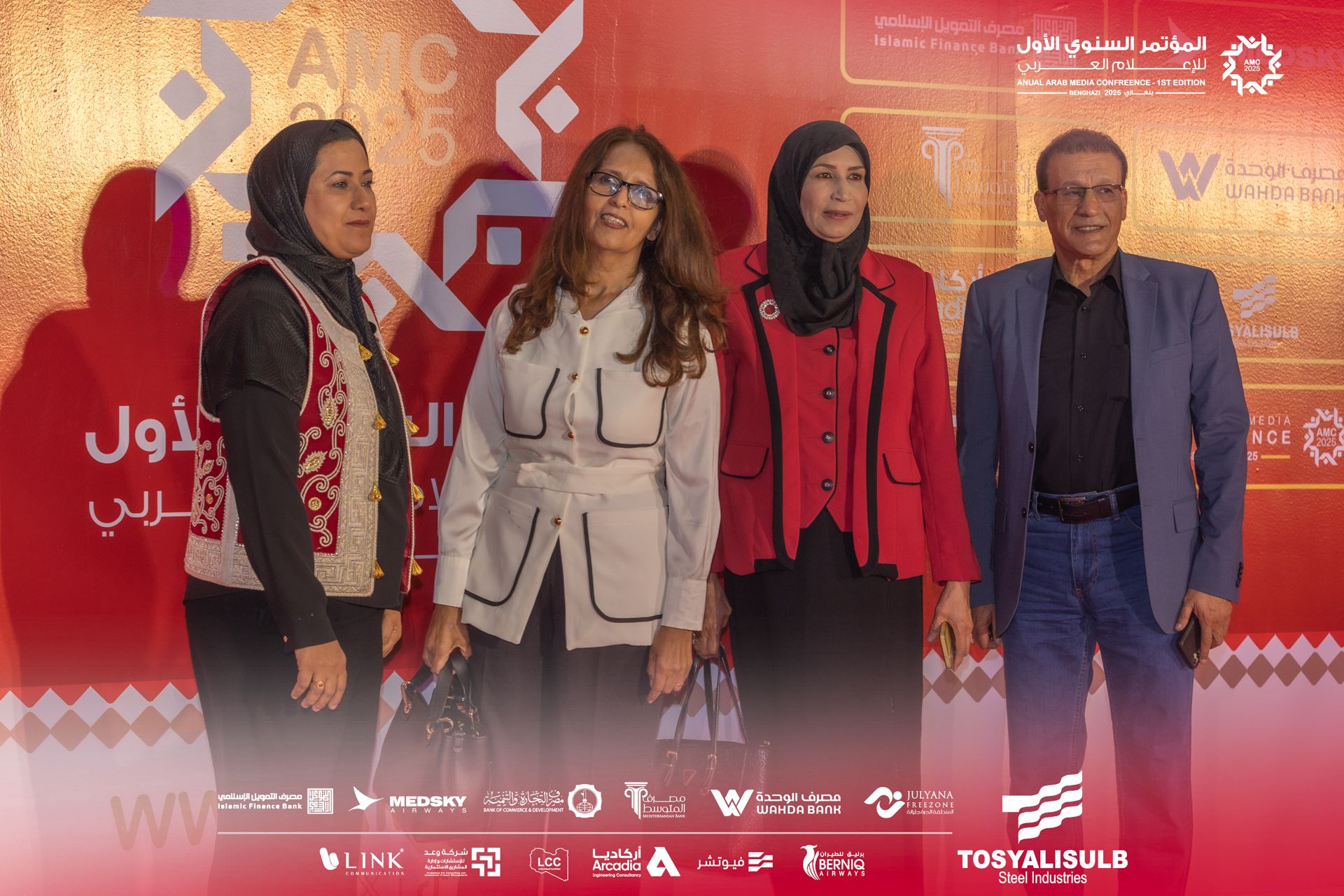 May be an image of ‎4 people, newsroom and ‎text that says '‎الاسلامي التعويل Islamic Inance 4 الأول السنوي lol لامم المؤتمر VEDIA ONTRE NFRCONGE- CONOE 1STCDITION aHA ሰብ ៣ ملصيفاfلوحدة WAHDA BAN لأول يربي YALISULB MEDTA NCE ف RANDe ・。aの WV MEDSKY 最用りをさせ。 WIROKATO. GLINK خرشعاومد 구구 Ao الوحدة مصرف WAHDA WAHDABANH BANH LCC ارخاديا Arcadia JULYANA GINZONE CISIONA فيوتشر BERNIA ABERNIA TOSYALISULB SteelIndustries Steel Industries‎'‎‎