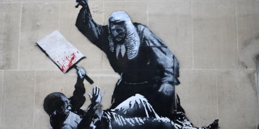 بانكسي فنان بريطاني مجهول يناضل بالرسم على جدرن العالم - زاجل الإخباري